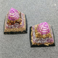 Two mini pyramids with pink wire spirals over gold flakes and lilac stone chips