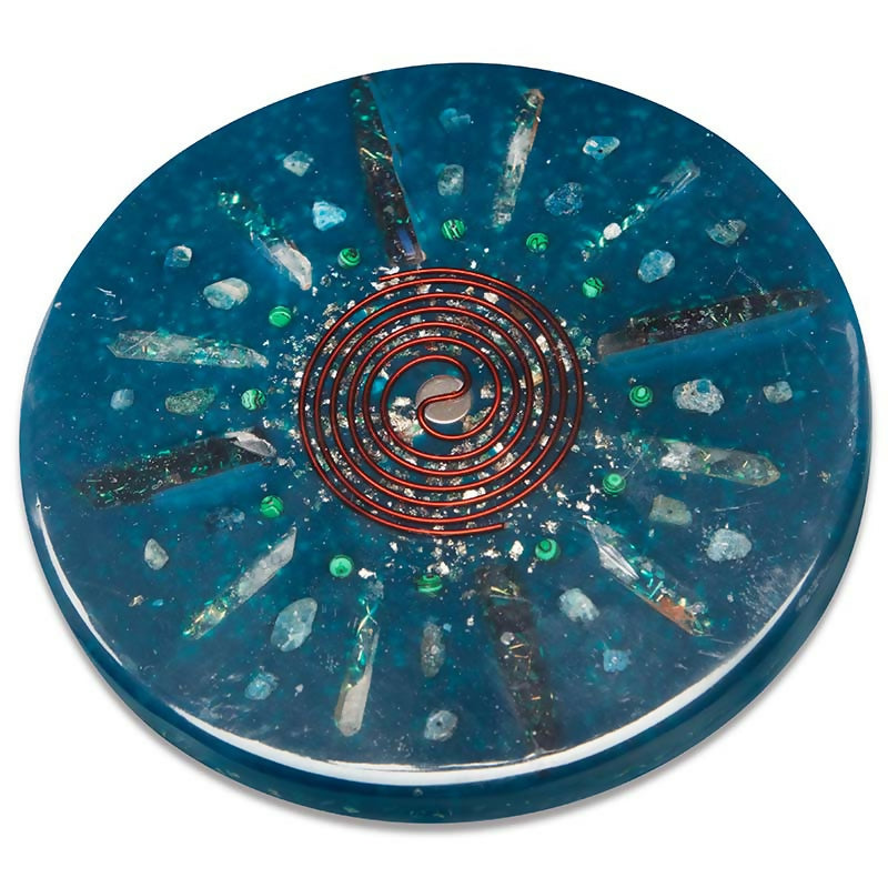 Dark & Mysterious Charging Plate by Orgonise Africa – round teal plate with a copper spiral at the centre, clear crystal points and dark stone rays, and small green flecks