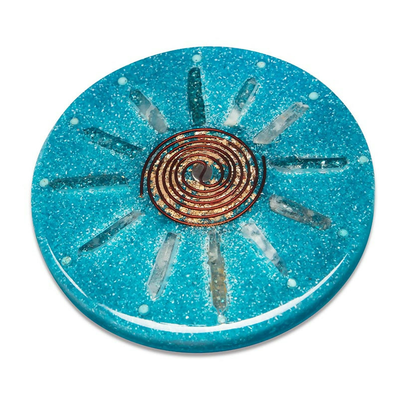 Dolomite Charging Plate by Orgonise Africa – round turquoise glitter plate with a copper spiral in the centre and clear crystal points arranged like sun rays
