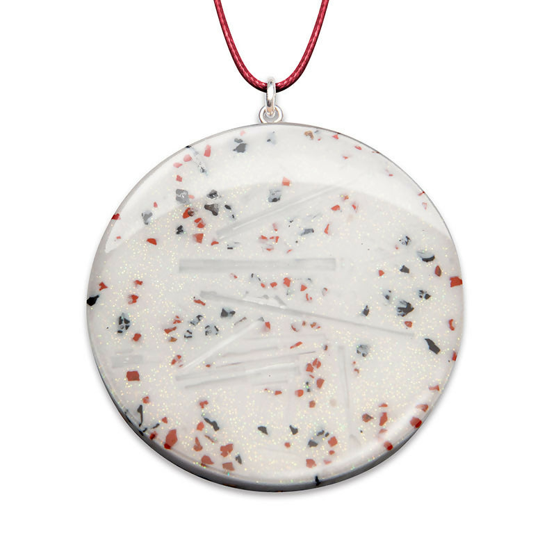 Kandinsky Pendant White by Orgonise Africa – round white pendant with clear crystal shards and red and black flecks, on a red cord