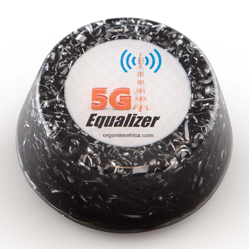 A dark, low, round Equalizer tower buster with visible pale flecks and a circular label on top