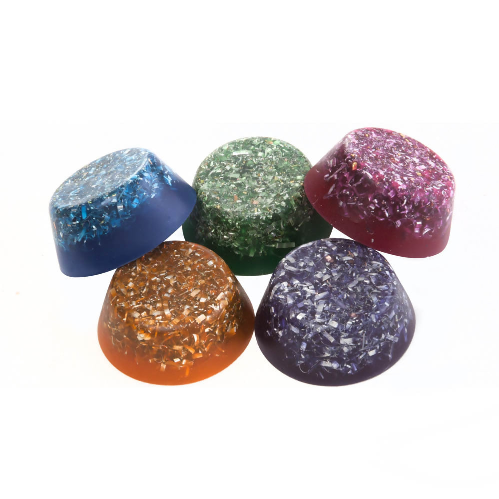 Five low, rounded Slick Jim tower busters in blue, green, pink, orange and purple, with visible metallic flecks
