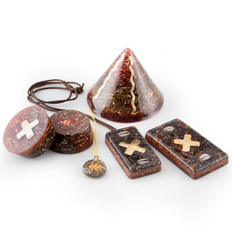 Muti Orgonite Bundle by Orgonise Africa – set of brown pieces: a cone, a round puck, two rectangular bricks with gold crosses and a small pendant on a cord