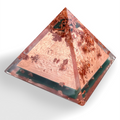 Copper Pyramid by Orgonise Africa – small clear pyramid filled with copper flakes over a dark green base layer, angled side view